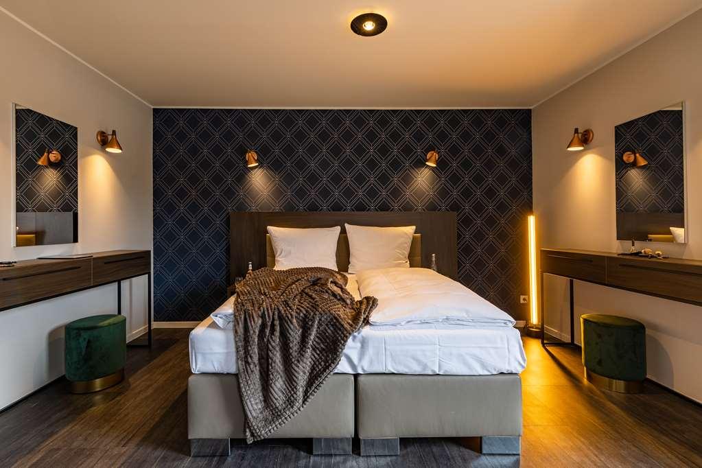 Maseven Muenchen Messe Dornach Lejlighedshotel Aschheim Værelse billede