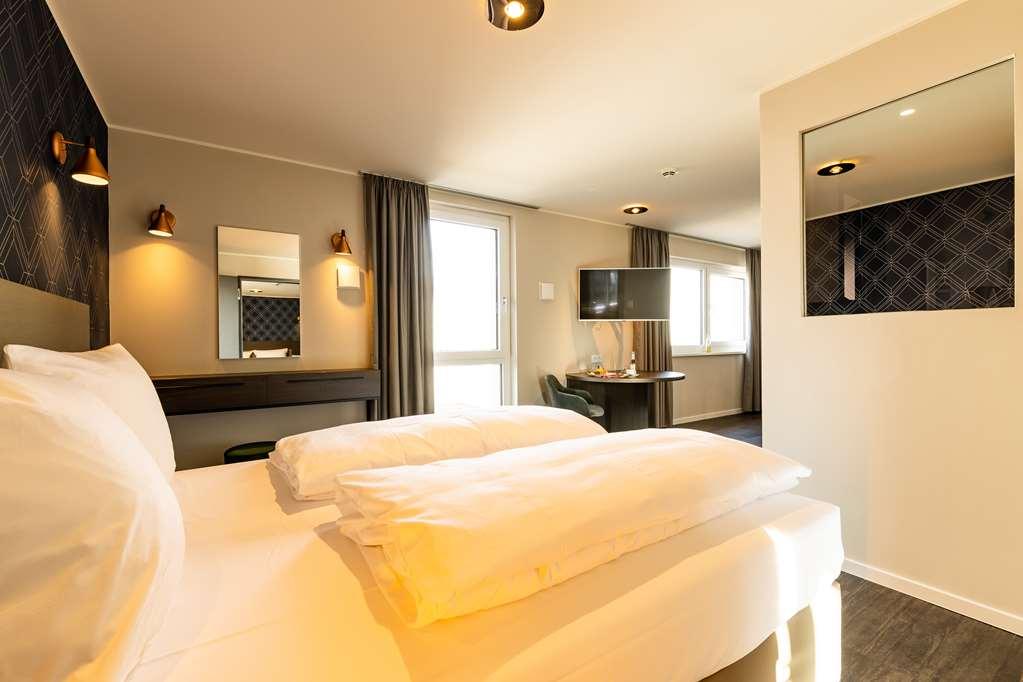 Maseven Muenchen Messe Dornach Lejlighedshotel Aschheim Værelse billede