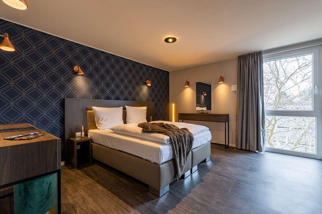 Maseven Muenchen Messe Dornach Lejlighedshotel Aschheim Værelse billede