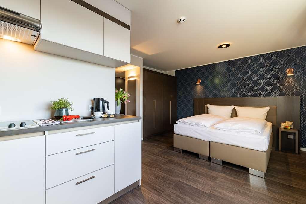 Maseven Muenchen Messe Dornach Lejlighedshotel Aschheim Værelse billede